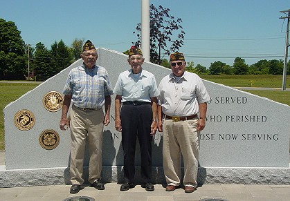Al Smith, Howard Devault and George Popp in front of the Veteran's Memorial at the East Greenwich Township Municipal Building on May 29, 2004