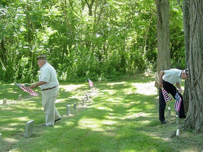 George Popp and  Howard Devault searching for the veteran stones