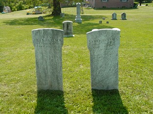 Two of the older tombstones