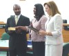 Joanna Korker administering the oath of office to Kimberli Barcus