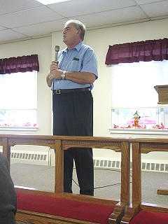 Rev. Richard Workman, Pastor of Zion Methodist Church offers a prayer