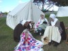 Colonial women busy sewing