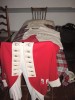 Example of a British soldier's uniform in the bedroom of the Whitall House, where the wounded were nursed.